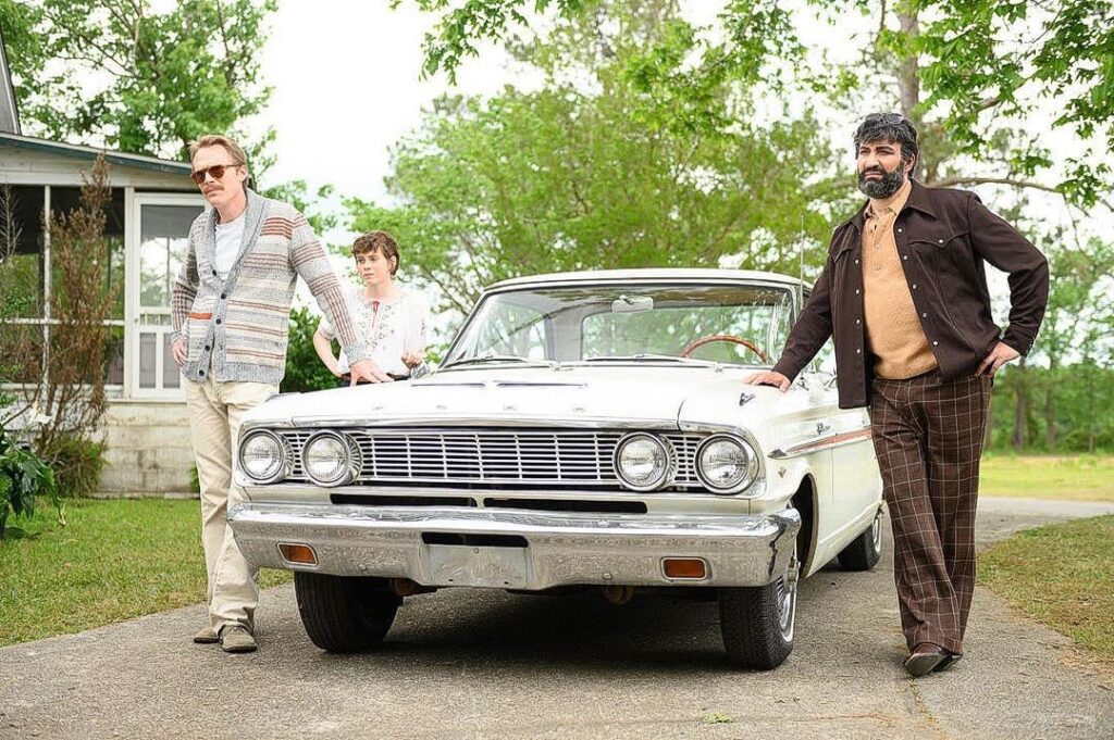 Paul Bettany, Peter Macdissi, and Sophia Lillis in Uncle Frank