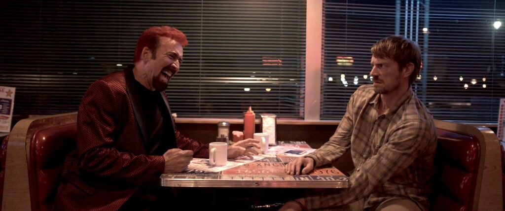 Nicolas Cage and Joel Kinnaman in SYMPATHY FOR THE DEVIL at Fantasia 2023